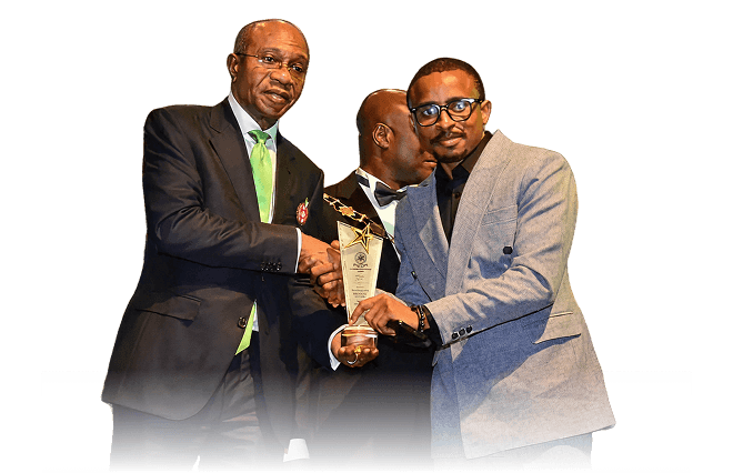 Solomon Ayodele receiving an award on stage